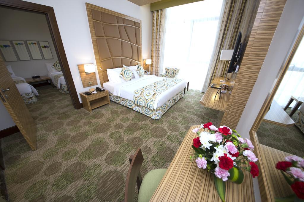 Best Western Plus Pearl Creek Дубай Стая снимка