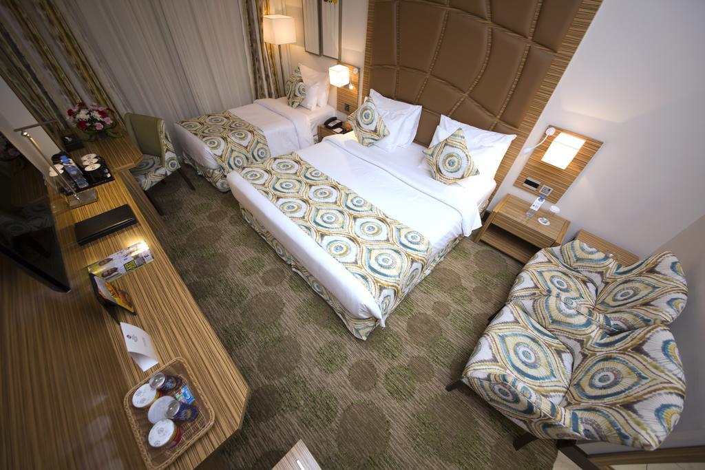 Best Western Plus Pearl Creek Дубай Стая снимка