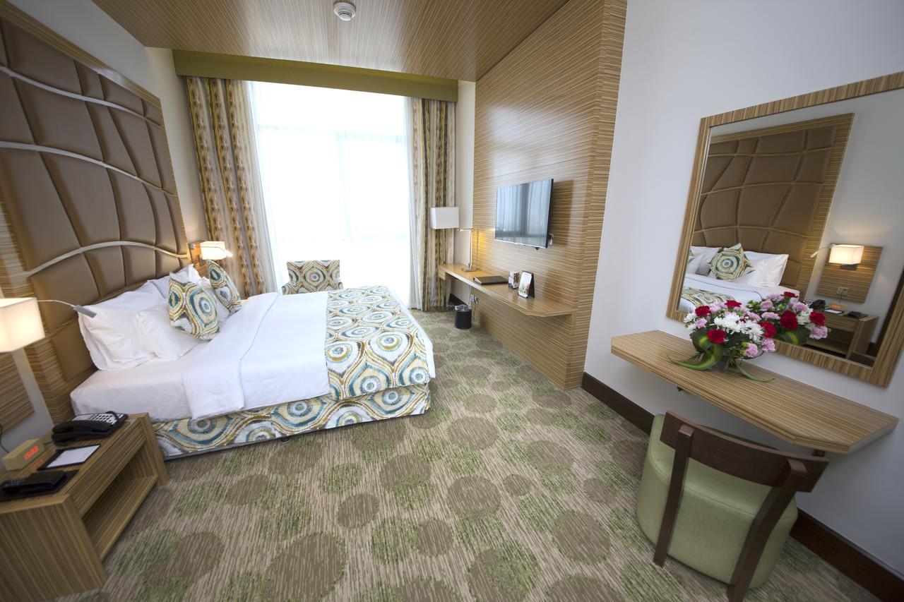 Best Western Plus Pearl Creek Дубай Екстериор снимка