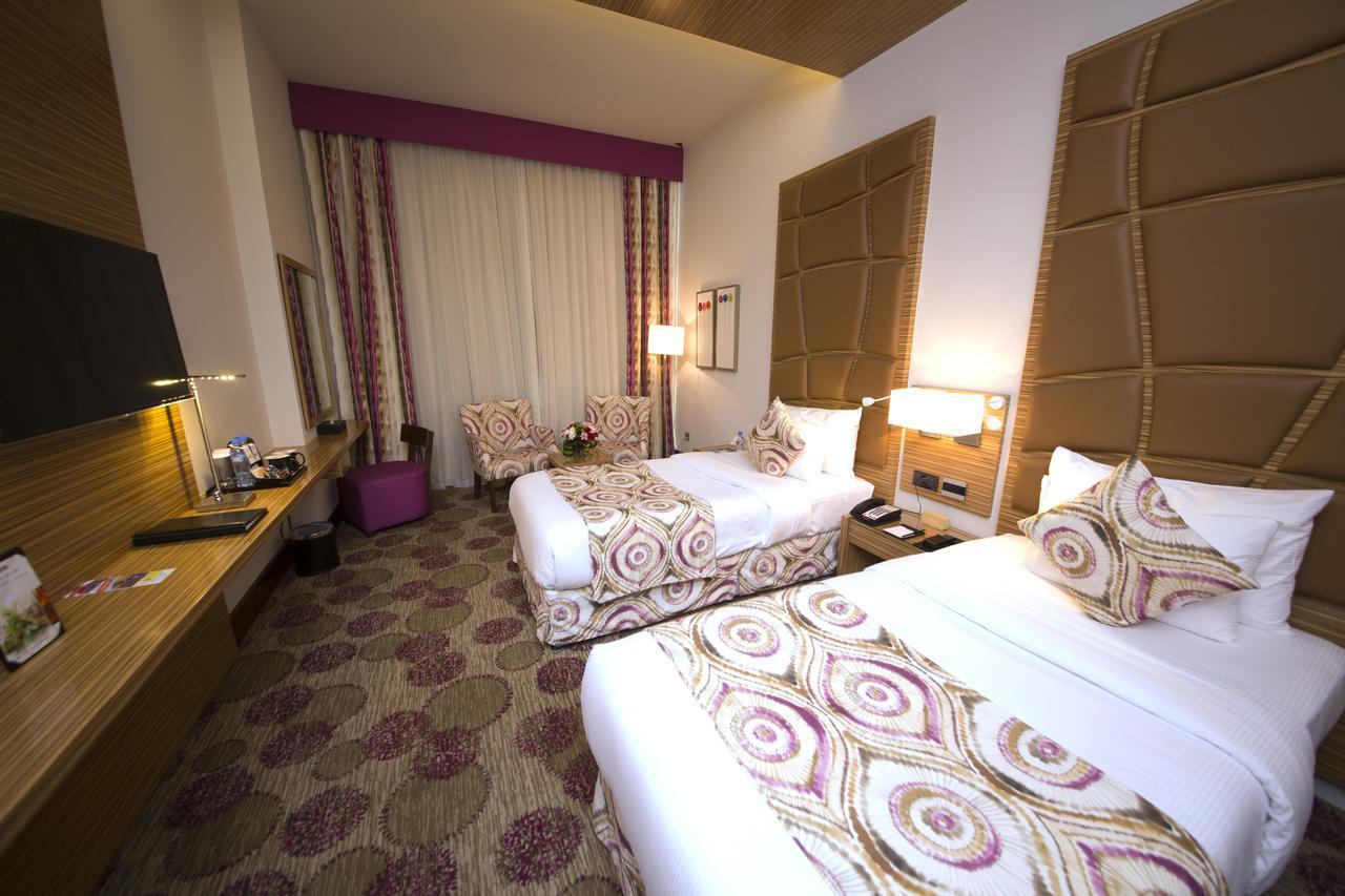 Best Western Plus Pearl Creek Дубай Екстериор снимка